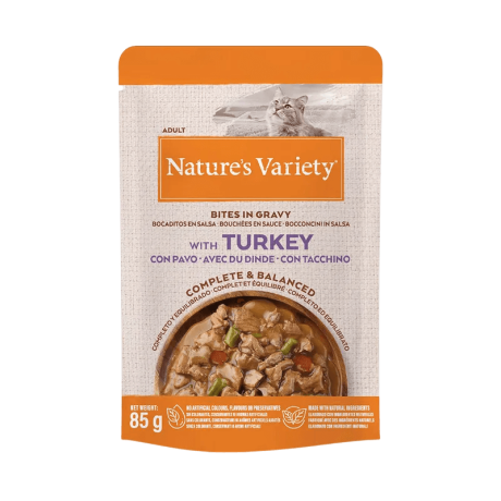 Envase de Nature's Variety Bocaditos en Salsa de Pavo 85gr Grain Free para gatos, comida húmeda completa con pavo.