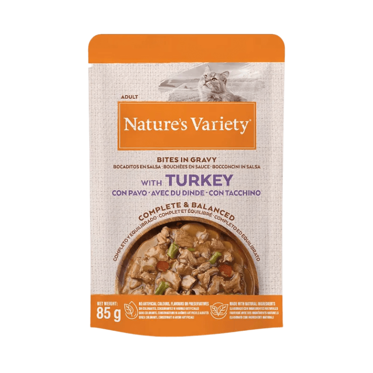 Envase de Nature's Variety Bocaditos en Salsa de Pavo 85gr Grain Free para gatos, comida húmeda completa con pavo.