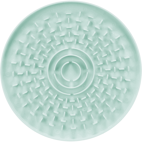 Vista cenital de la Bandeja para Lamer Lick'n'Snack Junior Trixie de 21cm, color verde menta, con un diseño de laberinto de postes cortos y anillos concéntricos. Está diseñado específicamente para cachorros.