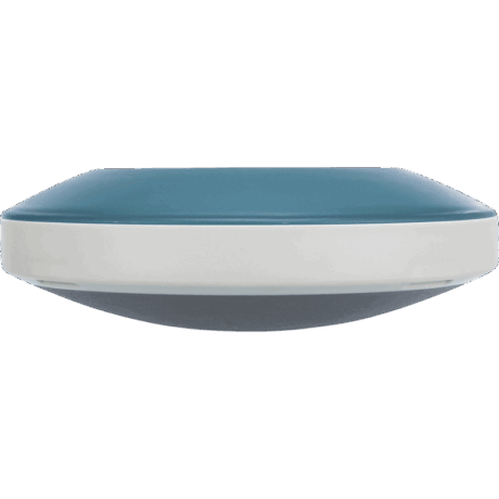 Vista lateral del comedero Slow Feeding Rocking Bowl de Trixie de 23cm. Se aprecia su diseño de base esférica (redondeada) en color blanco y el borde superior azul.