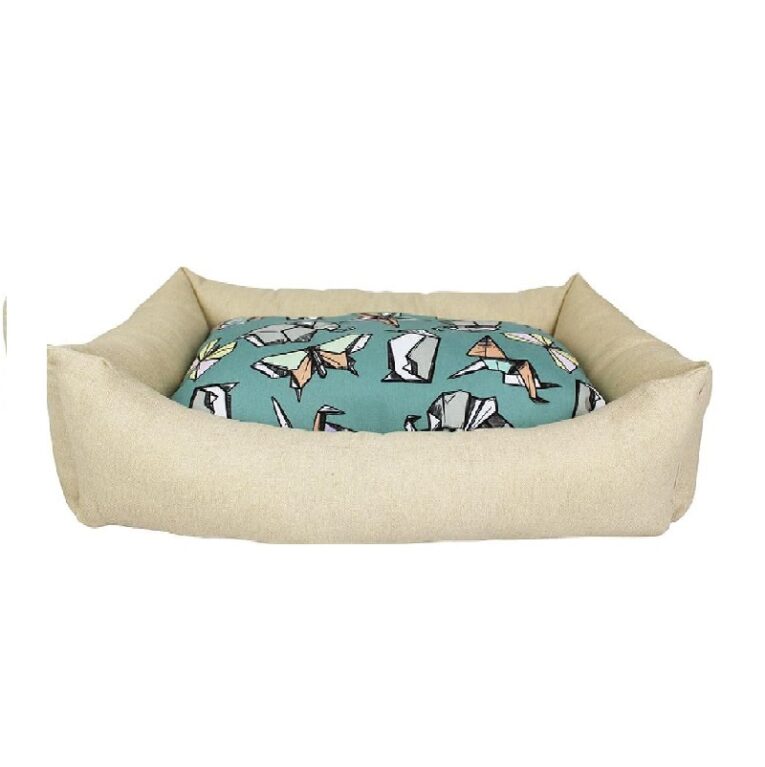 Cuna Nora Origami Plegable de Yagu. Diseño en crema y verde con estampado geométrico.