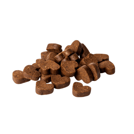 Bolsa de 60 gramos de snacks Moments de Pavo, semihúmedos y sin cereales, ideales para el adiestramiento y la dieta diaria de cachorros y perros adultos.